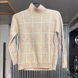 Beige Turtleneck Sweater with White Check Pattern